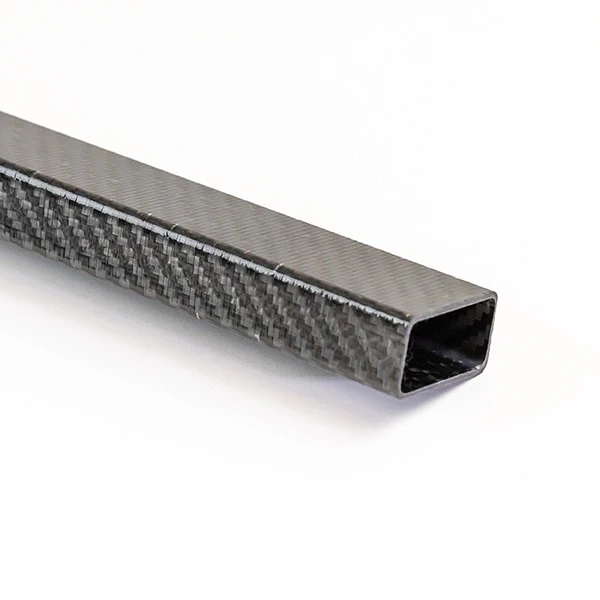 Carbon Fiber Roll Wrapped Twill Rectangle Tube ~1.0" X 2.0" X 72" (Uni/Twill) 1 Carbon Fiber Roll Wrapped Twill Rectangle Tube ~1.0" X 2.0" X 72" (Uni/Twill)